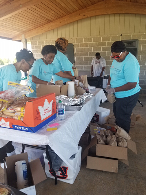 Members of the Alabama affiliate prepare food for participants of the affiliate’s first annual walkathon.